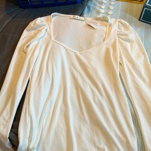 Vine and Love long sleeve top with capped shoulders.